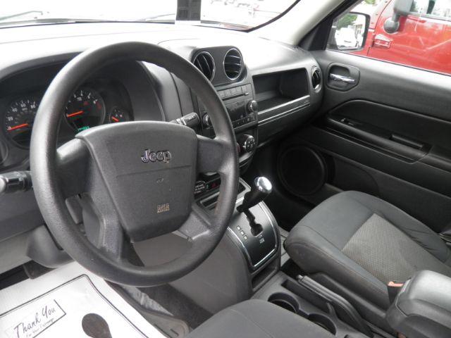2010 Green Jeep Patriot Sport (1J4NF2GB0AD) with an 2.4L I4 engine, AT transmission, located at 15520 McMullen Hwy SW, Belair, MD, 21502, (301) 729-3700, 39.581375, -78.846451 - Photo#2