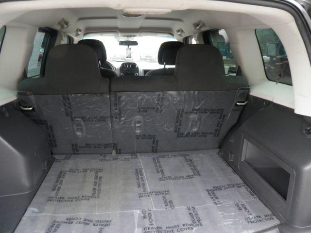 2010 Green Jeep Patriot Sport (1J4NF2GB0AD) with an 2.4L I4 engine, AT transmission, located at 15520 McMullen Hwy SW, Belair, MD, 21502, (301) 729-3700, 39.581375, -78.846451 - Photo#4