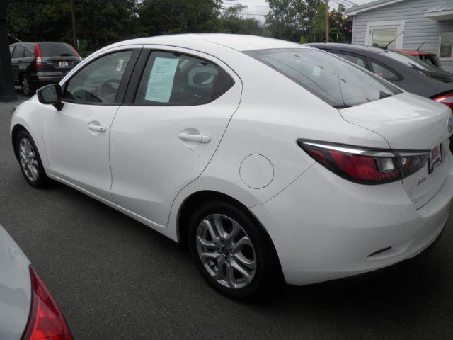 2016 White Scion iA BASE (3MYDLBZV7GY) with an 1.5L I4 engine, AT transmission, located at 15520 McMullen Hwy SW, Belair, MD, 21502, (301) 729-3700, 39.581375, -78.846451 - Photo#4