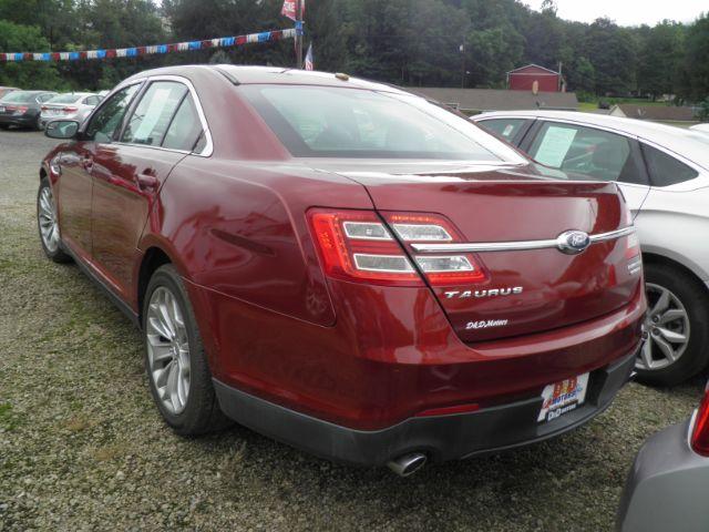 2014 ORANGE Ford Taurus Limited (1FAHP2F80EG) with an 2.4L L4 engine, AT transmission, located at 19521 New George's Creek Rd SW, Barton, MD, 21521, (301) 463-2404, 39.524323, -79.017906 - Photo#4
