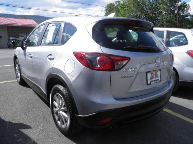 2016 Silver Mazda CX-5 Sport (JM3KE4BY1G0) with an 2.5L I4 engine, AT transmission, located at 15520 McMullen Hwy SW, Belair, MD, 21502, (301) 729-3700, 39.581375, -78.846451 - Photo#5