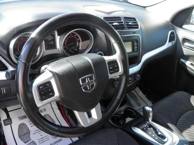 2013 Blue Dodge Journey SE (3C4PDCAB8DT) with an 2.4L I4 engine, AT transmission, located at 15520 McMullen Hwy SW, Belair, MD, 21502, (301) 729-3700, 39.581375, -78.846451 - Photo#2