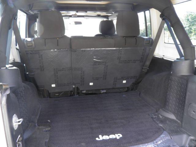 2013 White Jeep Wrangler Unlimited Sport (1C4BJWDGXDL) with an 3.6L V6 engine, AT transmission, located at 15520 McMullen Hwy SW, Belair, MD, 21502, (301) 729-3700, 39.581375, -78.846451 - Photo#4