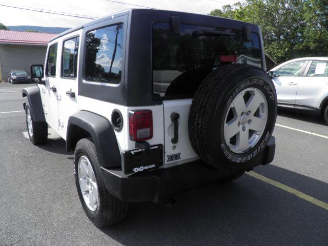 2013 White Jeep Wrangler Unlimited Sport (1C4BJWDGXDL) with an 3.6L V6 engine, AT transmission, located at 15520 McMullen Hwy SW, Belair, MD, 21502, (301) 729-3700, 39.581375, -78.846451 - Photo#5