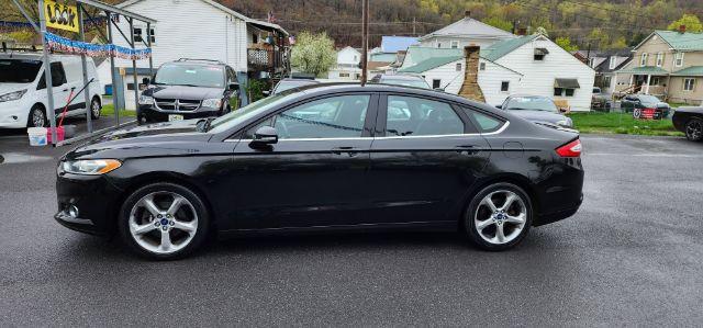 2015 BLACK /Charcoal Black Ford Fusion SE (3FA6P0H70FR) with an 2.5 L4 engine, AT transmission, 0.000000, 0.000000 - FOR A BETTER PRICE CALL PAUL AT 301-268-8150 - Photo#3