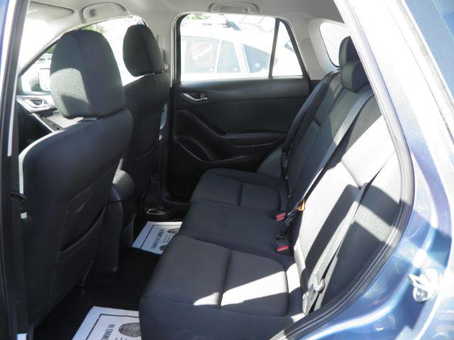 2016 Blue Mazda CX-5 Sport (JM3KE4BY5G0) with an 2.5L I4 engine, AT transmission, located at 15520 McMullen Hwy SW, Belair, MD, 21502, (301) 729-3700, 39.581375, -78.846451 - Photo#3