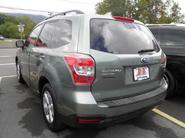 2016 Green Subaru Forester 2.5i Premium (JF2SJAGC5GH) with an 2.5L H4 engine, AT transmission, located at 15520 McMullen Hwy SW, Belair, MD, 21502, (301) 729-3700, 39.581375, -78.846451 - Photo#5