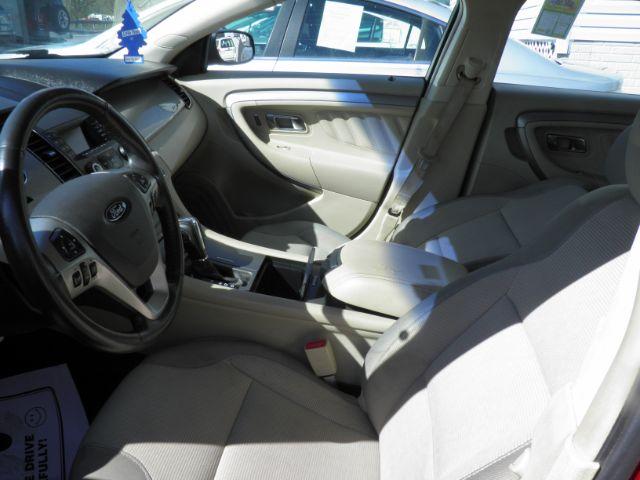 2015 Red Ford Taurus SEL (1FAHP2E88FG) with an 3.5L V6 engine, AT transmission, located at 15520 McMullen Hwy SW, Belair, MD, 21502, (301) 729-3700, 39.581375, -78.846451 - Photo#1