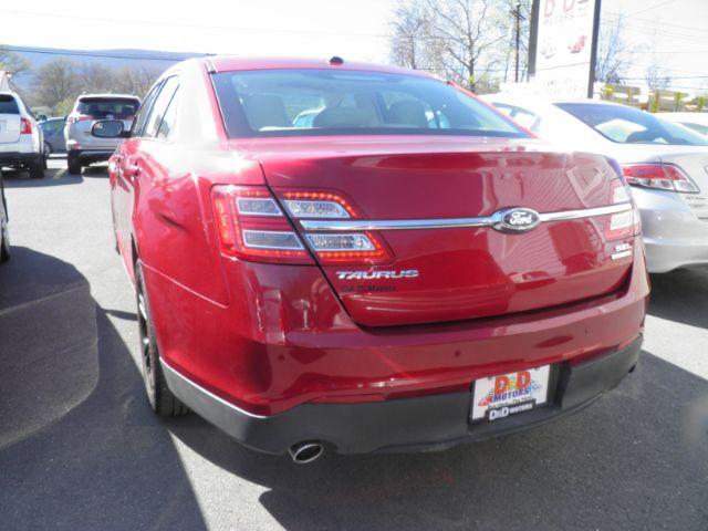 2015 Red Ford Taurus SEL (1FAHP2E88FG) with an 3.5L V6 engine, AT transmission, located at 15520 McMullen Hwy SW, Belair, MD, 21502, (301) 729-3700, 39.581375, -78.846451 - Photo#4