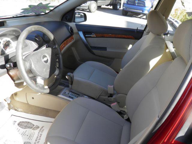 2007 Red /Neutral Cloth Seats Chevrolet Aveo LS 4-Door (KL1TD56627B) with an 1.6L I4 engine, AT transmission, located at 15520 McMullen Hwy SW, Belair, MD, 21502, (301) 729-3700, 39.581375, -78.846451 - Photo#1