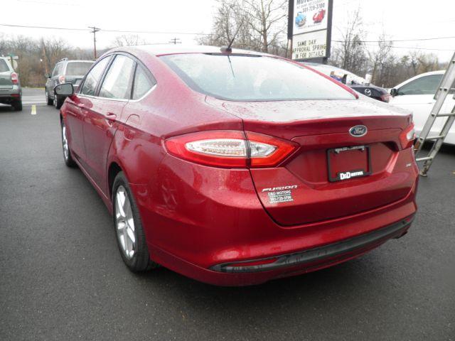 2014 Red Ford Fusion SE (1FA6P0H72E5) with an 2.5L I4 engine, AT transmission, located at 15520 McMullen Hwy SW, Belair, MD, 21502, (301) 729-3700, 39.581375, -78.846451 - Photo#4