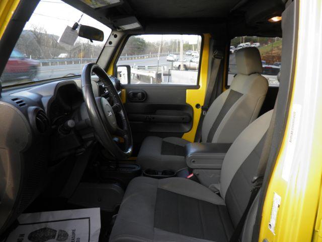 2008 Yellow Jeep Wrangler Unlimited X (1J8GA39198L) with an 3.8L V6 engine, AT transmission, located at 15520 McMullen Hwy SW, Belair, MD, 21502, (301) 729-3700, 39.581375, -78.846451 - Photo#1