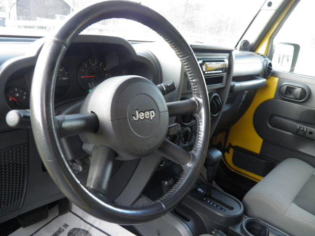 2008 Yellow Jeep Wrangler Unlimited X (1J8GA39198L) with an 3.8L V6 engine, AT transmission, located at 15520 McMullen Hwy SW, Belair, MD, 21502, (301) 729-3700, 39.581375, -78.846451 - Photo#2