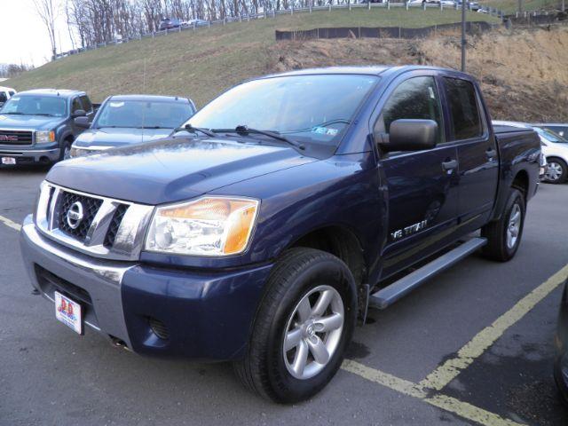 2011 Blue Nissan Titan SV (1N6AA0EJ8BN) with an 5.6L V8 engine, AT transmission, located at 15520 McMullen Hwy SW, Belair, MD, 21502, (301) 729-3700, 39.581375, -78.846451 - Photo#0