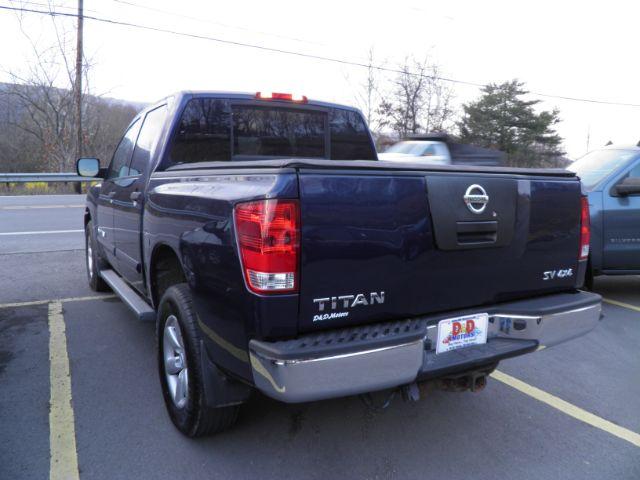 2011 Blue Nissan Titan SV (1N6AA0EJ8BN) with an 5.6L V8 engine, AT transmission, located at 15520 McMullen Hwy SW, Belair, MD, 21502, (301) 729-3700, 39.581375, -78.846451 - Photo#4