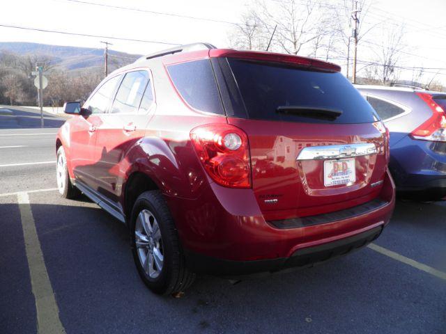 2015 Red Chevrolet Equinox 1LT (1GNFLFEK0FZ) with an 2.4L I4 engine, AT transmission, located at 15520 McMullen Hwy SW, Belair, MD, 21502, (301) 729-3700, 39.581375, -78.846451 - Photo#5