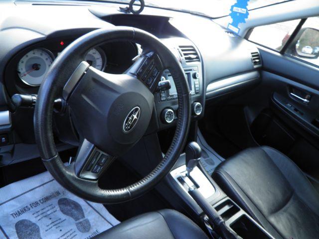 2012 RED Subaru Impreza 2.0i Sport Limited (JF1GPAS60CH) with an 2.4L 4 engine, CVT transmission, located at 19521 New George's Creek Rd SW, Barton, MD, 21521, (301) 463-2404, 39.524323, -79.017906 - Photo#2