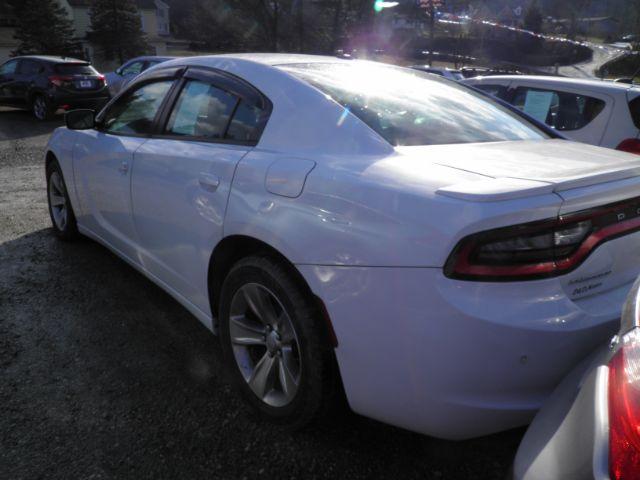 2015 WHITE Dodge Charger SE (2C3CDXBG8FH) with an 3.6L V6 engine, AT transmission, located at 19521 New George's Creek Rd SW, Barton, MD, 21521, (301) 463-2404, 39.524323, -79.017906 - Photo#4