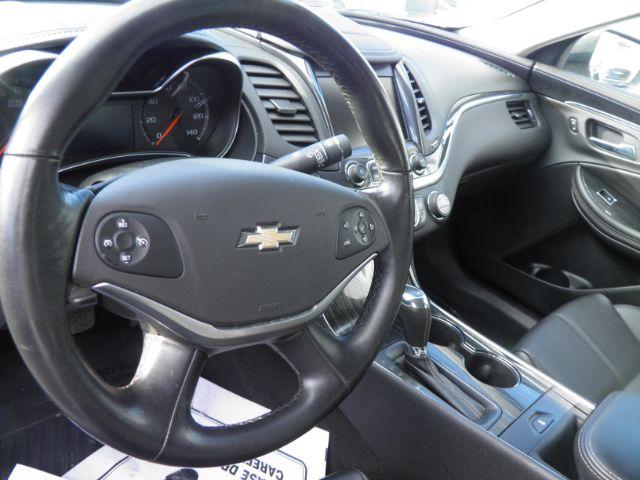 2017 White Chevrolet Impala LT (2G1105S31H9) with an 3.6L V6 engine, AT transmission, located at 15520 McMullen Hwy SW, Belair, MD, 21502, (301) 729-3700, 39.581375, -78.846451 - Photo#2