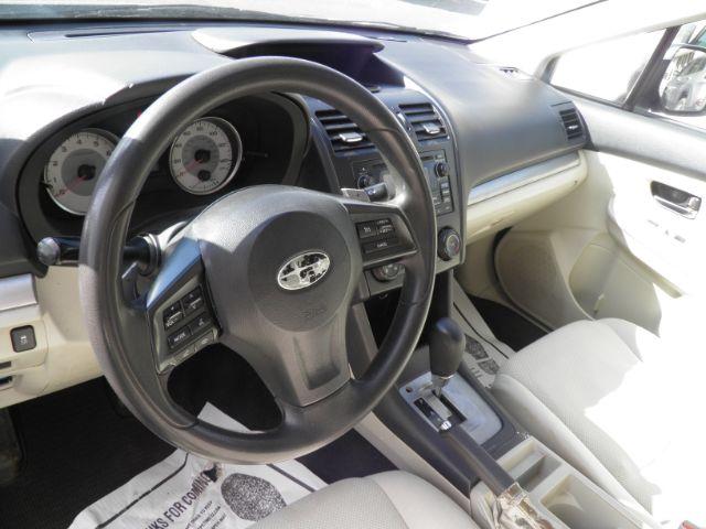 2013 BLACK Subaru Impreza 2.0i Premium (JF1GPAC68D2) with an 2.4L 4 engine, CVT transmission, located at 15520 McMullen Hwy SW, Belair, MD, 21502, (301) 729-3700, 39.581375, -78.846451 - Photo#2