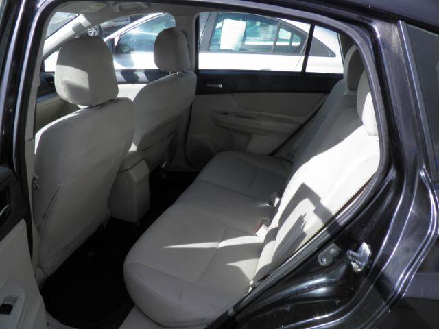 2013 BLACK Subaru Impreza 2.0i Premium (JF1GPAC68D2) with an 2.4L 4 engine, CVT transmission, located at 15520 McMullen Hwy SW, Belair, MD, 21502, (301) 729-3700, 39.581375, -78.846451 - Photo#3