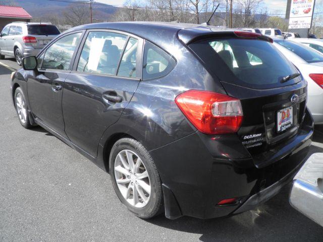 2013 BLACK Subaru Impreza 2.0i Premium (JF1GPAC68D2) with an 2.4L 4 engine, CVT transmission, located at 15520 McMullen Hwy SW, Belair, MD, 21502, (301) 729-3700, 39.581375, -78.846451 - Photo#4