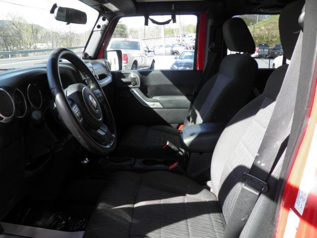 2011 RED Jeep Wrangler Unlimited Sahara (1J4BA5H12BL) with an 3.8 V6 engine, AT transmission, located at 15520 McMullen Hwy SW, Belair, MD, 21502, (301) 729-3700, 39.581375, -78.846451 - Photo#1