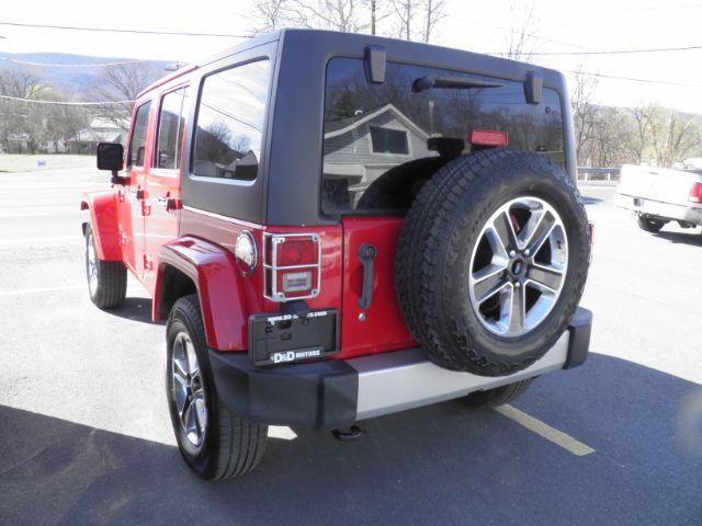 2011 RED Jeep Wrangler Unlimited Sahara (1J4BA5H12BL) with an 3.8 V6 engine, AT transmission, located at 15520 McMullen Hwy SW, Belair, MD, 21502, (301) 729-3700, 39.581375, -78.846451 - Photo#4