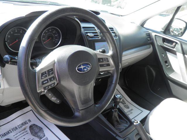 2015 GREEN Subaru Forester 2.5i Premium (JF2SJADC9FG) with an 2.5 L4 engine, CVT transmission, located at 15520 McMullen Hwy SW, Belair, MD, 21502, (301) 729-3700, 39.581375, -78.846451 - Photo#2
