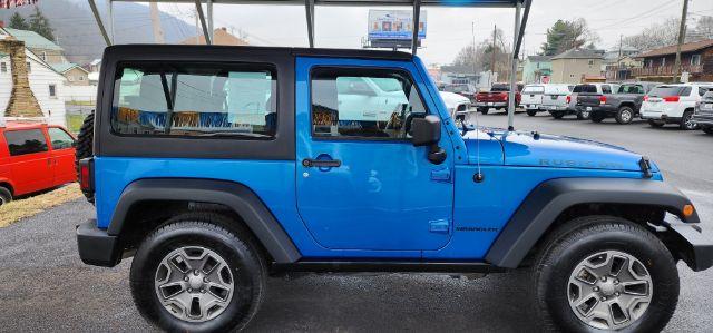 2015 BLUE /Black Jeep Wrangler Rubicon (1C4BJWCGXFL) with an 3.6L V6 engine, AT transmission, located at 15520 McMullen Hwy SW, Belair, MD, 21502, (301) 729-3700, 39.581375, -78.846451 - Photo#12