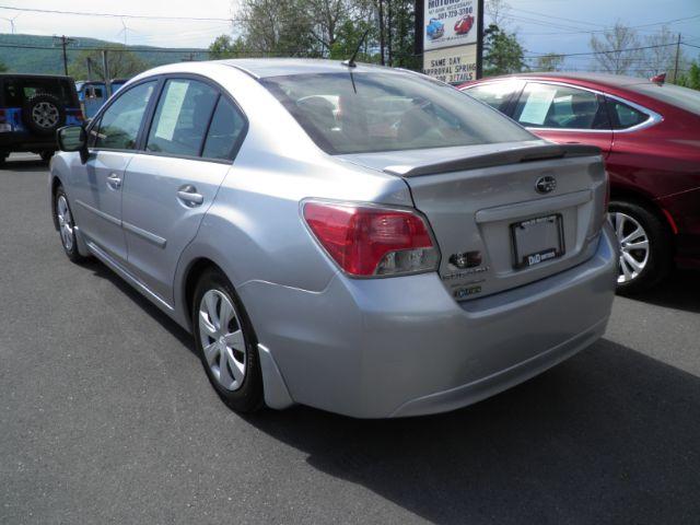 2014 SILVER Subaru Impreza 2.0i (JF1GJAA64EH) with an 2.4L L4 engine, CVT transmission, located at 15520 McMullen Hwy SW, Belair, MD, 21502, (301) 729-3700, 39.581375, -78.846451 - Photo#4