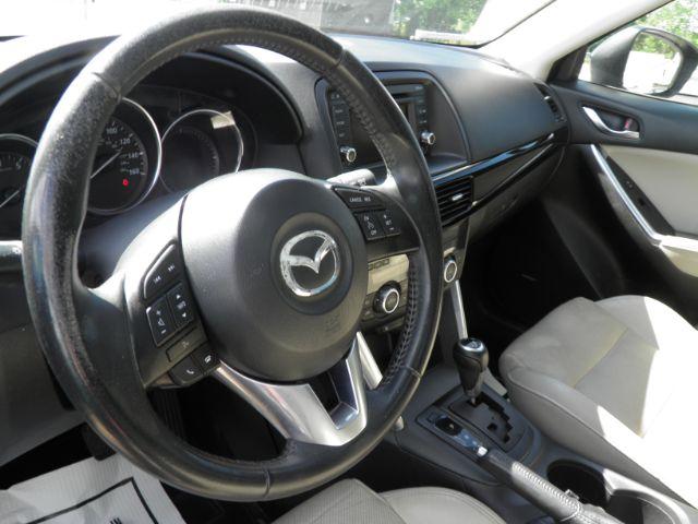 2013 BLUE Mazda CX-5 Grand Touring (JM3KE4DE2D0) with an 2.4L L4 engine, AT transmission, located at 15520 McMullen Hwy SW, Belair, MD, 21502, (301) 729-3700, 39.581375, -78.846451 - Photo#2