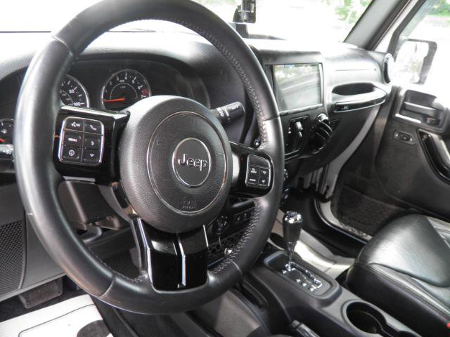 2015 SILVER Jeep Wrangler Unlimited Altitude (1C4BJWEG3FL) with an 3.6L V6 engine, located at 15520 McMullen Hwy SW, Belair, MD, 21502, (301) 729-3700, 39.581375, -78.846451 - Photo#2