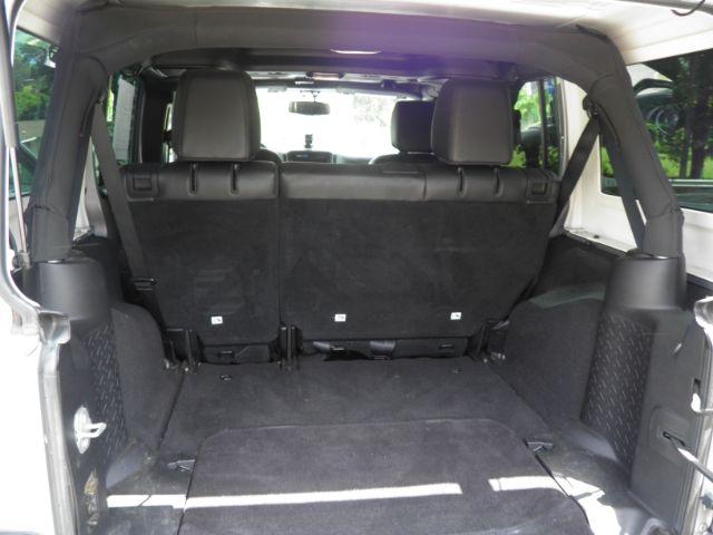 2015 SILVER Jeep Wrangler Unlimited Altitude (1C4BJWEG3FL) with an 3.6L V6 engine, located at 15520 McMullen Hwy SW, Belair, MD, 21502, (301) 729-3700, 39.581375, -78.846451 - Photo#4