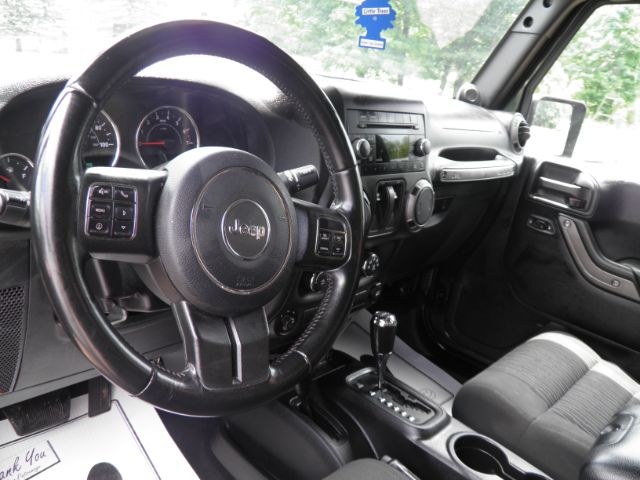 2011 GREEN Jeep Wrangler Sport 4WD (1J4AA2D17BL) with an 3.8 V6 engine, located at 19521 New George's Creek Rd SW, Barton, MD, 21521, (301) 463-2404, 39.524323, -79.017906 - Photo#2