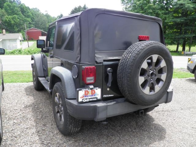 2011 GREEN Jeep Wrangler Sport 4WD (1J4AA2D17BL) with an 3.8 V6 engine, located at 19521 New George's Creek Rd SW, Barton, MD, 21521, (301) 463-2404, 39.524323, -79.017906 - Photo#5