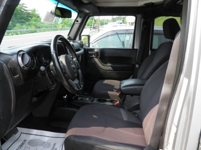 2013 Silver /Black Cloth Interior Jeep Wrangler Unlimited Sport 4WD (1C4BJWDG6DL) with an 3.6L V6 engine, AT transmission, located at 15520 McMullen Hwy SW, Belair, MD, 21502, (301) 729-3700, 39.581375, -78.846451 - Photo#1
