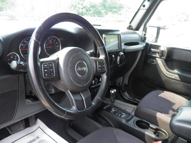 2013 Silver /Black Cloth Interior Jeep Wrangler Unlimited Sport 4WD (1C4BJWDG6DL) with an 3.6L V6 engine, AT transmission, located at 15520 McMullen Hwy SW, Belair, MD, 21502, (301) 729-3700, 39.581375, -78.846451 - Photo#2