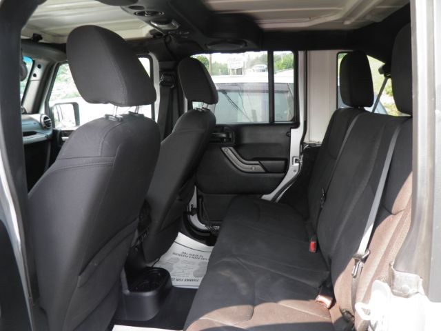 2013 Silver /Black Cloth Interior Jeep Wrangler Unlimited Sport 4WD (1C4BJWDG6DL) with an 3.6L V6 engine, AT transmission, located at 15520 McMullen Hwy SW, Belair, MD, 21502, (301) 729-3700, 39.581375, -78.846451 - Photo#3