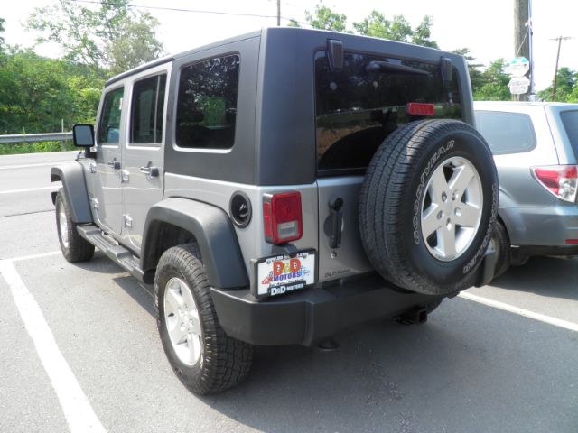 2013 Silver /Black Cloth Interior Jeep Wrangler Unlimited Sport 4WD (1C4BJWDG6DL) with an 3.6L V6 engine, AT transmission, located at 15520 McMullen Hwy SW, Belair, MD, 21502, (301) 729-3700, 39.581375, -78.846451 - Photo#5