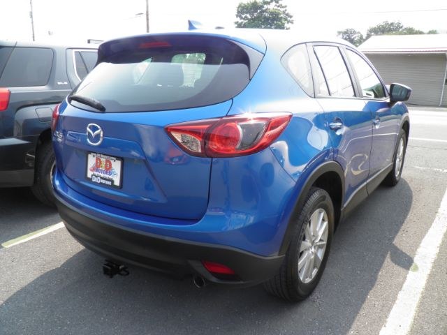 2014 BLUE Mazda CX-5 Sport (JM3KE4BE1E0) with an 2.4L L4 engine, located at 15520 McMullen Hwy SW, Belair, MD, 21502, (301) 729-3700, 39.581375, -78.846451 - Photo#5