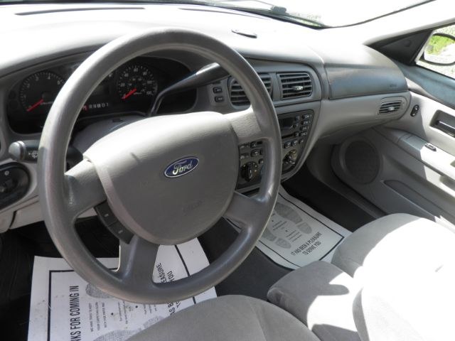 2007 GREEN Ford Taurus SE (1FAFP53U37A) with an 3.6L V6 engine, AT transmission, located at 15520 McMullen Hwy SW, Belair, MD, 21502, (301) 729-3700, 39.581375, -78.846451 - Photo#2