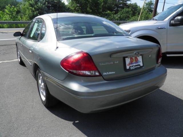 2007 GREEN Ford Taurus SE (1FAFP53U37A) with an 3.6L V6 engine, AT transmission, located at 15520 McMullen Hwy SW, Belair, MD, 21502, (301) 729-3700, 39.581375, -78.846451 - Photo#4