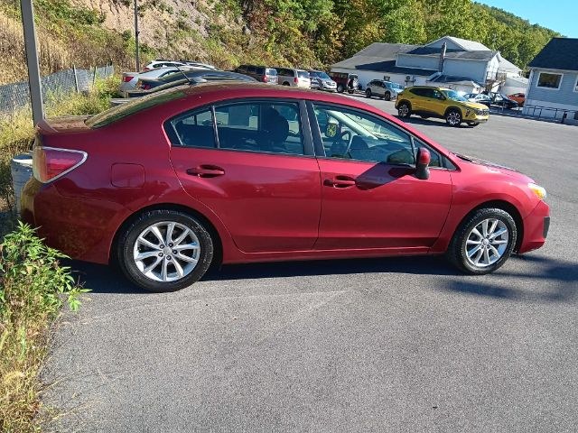2013 RED Subaru Impreza 2.0i Premium (JF1GJAC6XDH) with an 2L H4 engine, CVT transmission, located at 15520 McMullen Hwy SW, Belair, MD, 21502, (301) 729-3700, 39.581375, -78.846451 - Photo#3