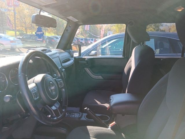 2015 BLACK Jeep Wrangler Unlimited Sport (1C4BJWDG2FL) with an 3.6L V6 engine, located at 19521 New George's Creek Rd SW, Barton, MD, 21521, (301) 463-2404, 39.524323, -79.017906 - Photo#1