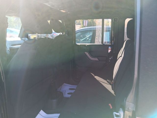 2015 BLACK Jeep Wrangler Unlimited Sport (1C4BJWDG2FL) with an 3.6L V6 engine, located at 19521 New George's Creek Rd SW, Barton, MD, 21521, (301) 463-2404, 39.524323, -79.017906 - Photo#2