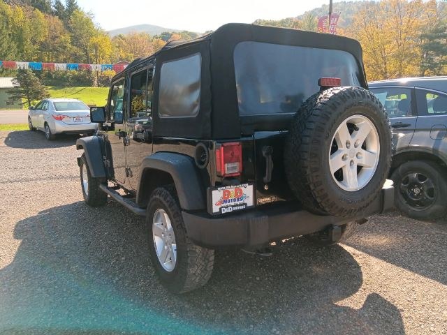 2015 BLACK Jeep Wrangler Unlimited Sport (1C4BJWDG2FL) with an 3.6L V6 engine, located at 19521 New George's Creek Rd SW, Barton, MD, 21521, (301) 463-2404, 39.524323, -79.017906 - Photo#4