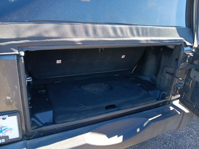 2016 GRAY Jeep Wrangler Sport (1C4AJWAG3GL) with an 3.6L V6 engine, 6SP transmission, located at 19521 New George's Creek Rd SW, Barton, MD, 21521, (301) 463-2404, 39.524323, -79.017906 - Photo#2