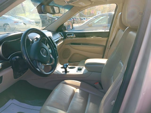 2014 GOLD Jeep Grand Cherokee Limited (1C4RJFBG3EC) with an 3.6L V6 engine, AT transmission, located at 19521 New George's Creek Rd SW, Barton, MD, 21521, (301) 463-2404, 39.524323, -79.017906 - Photo#1